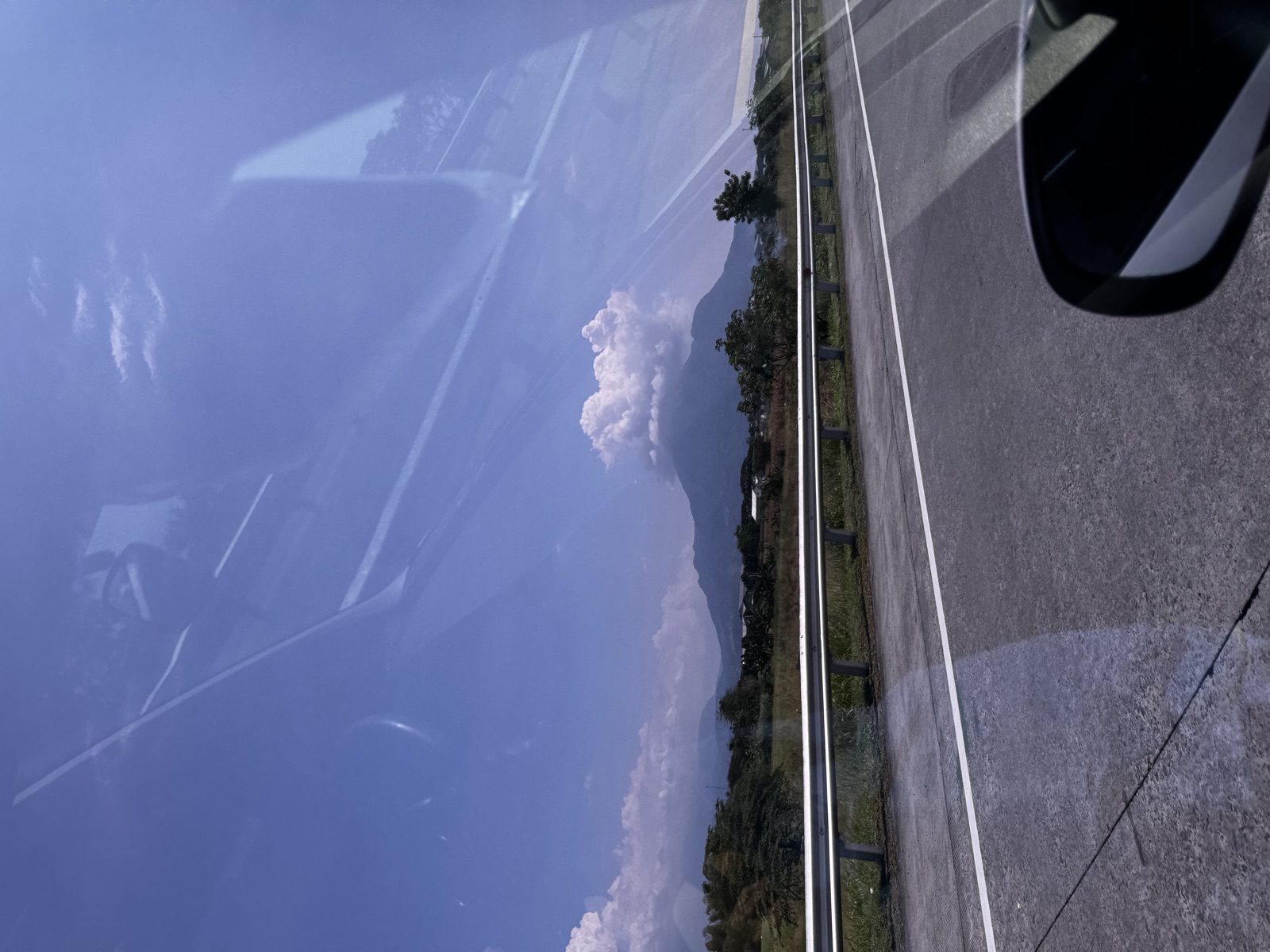 Mountain view through a car window on the road back from the Bromo area