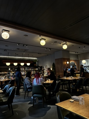 Warm dining room interior at August in Jakarta