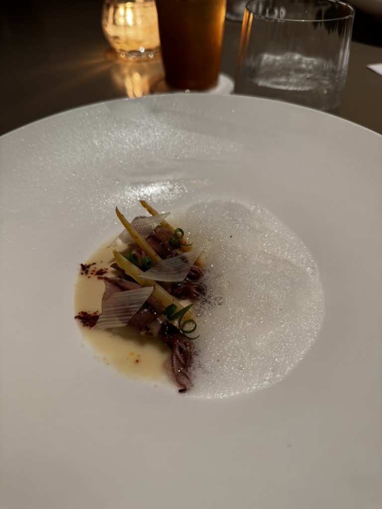 Firefly squid course with white asparagus and foam