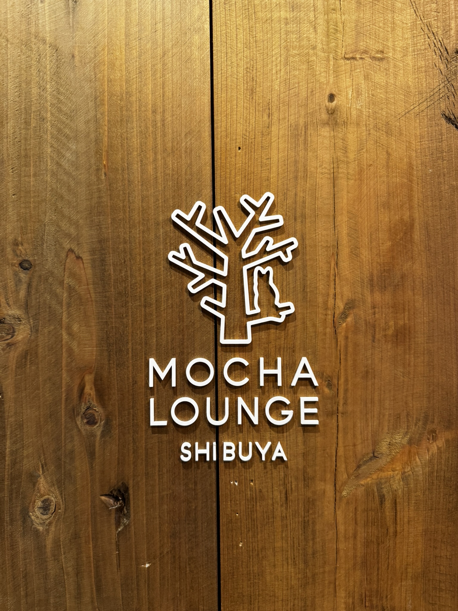 Wooden MOCHA Lounge Shibuya sign